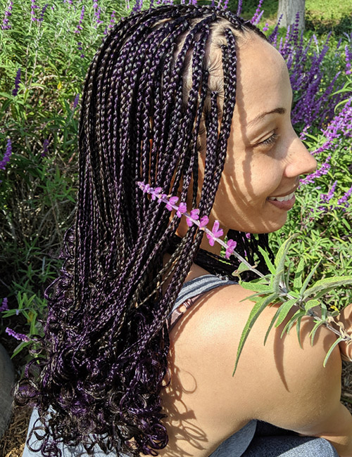 Shoulder-length knotless braids with open ringlets