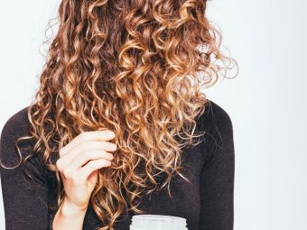 Woman applying a homemade conditioner for curly hair